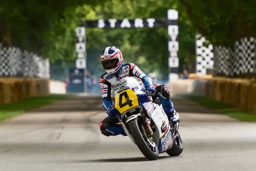 Rider cornering right at the Goodwood Festival of Speed