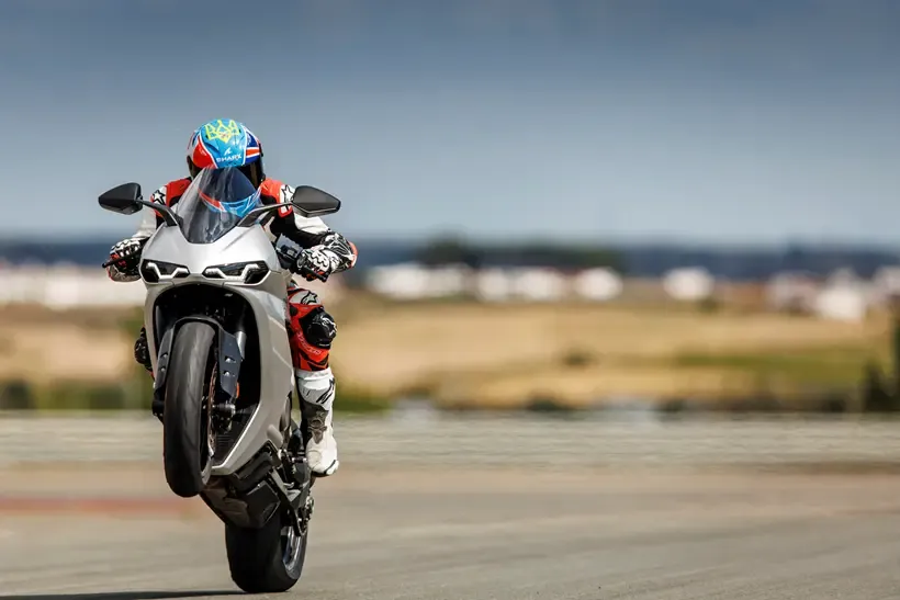 2026-on Norton Manx R Signature popping the front wheel on track